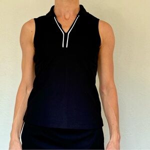 Black, sleeveless polo shirt with white details, perfect for #golf or #tennis